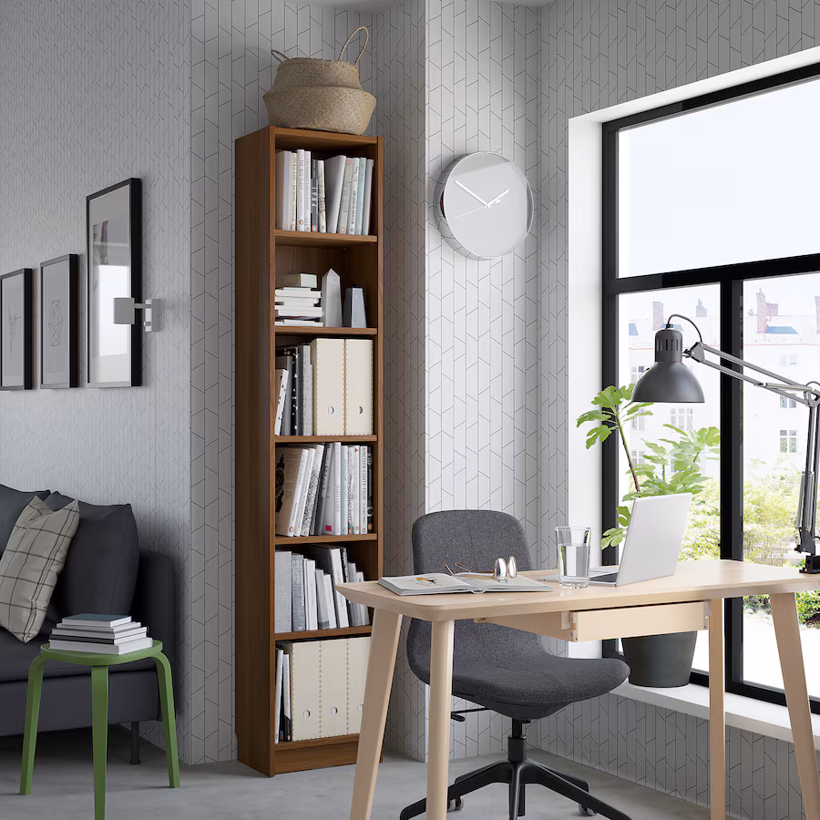 The BILLY bookcase is a timeless favorite, known for its versatility. It works perfectly in any home, whether you're storing books or everyday essentials. (Source: IKEA)
