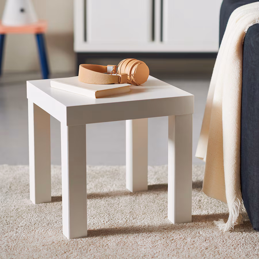 This compact LACK table is versatile for any room and can easily slide under larger tables from the same series to save space. Its smart design makes assembly, lifting, and moving a breeze. (Source: IKEA)