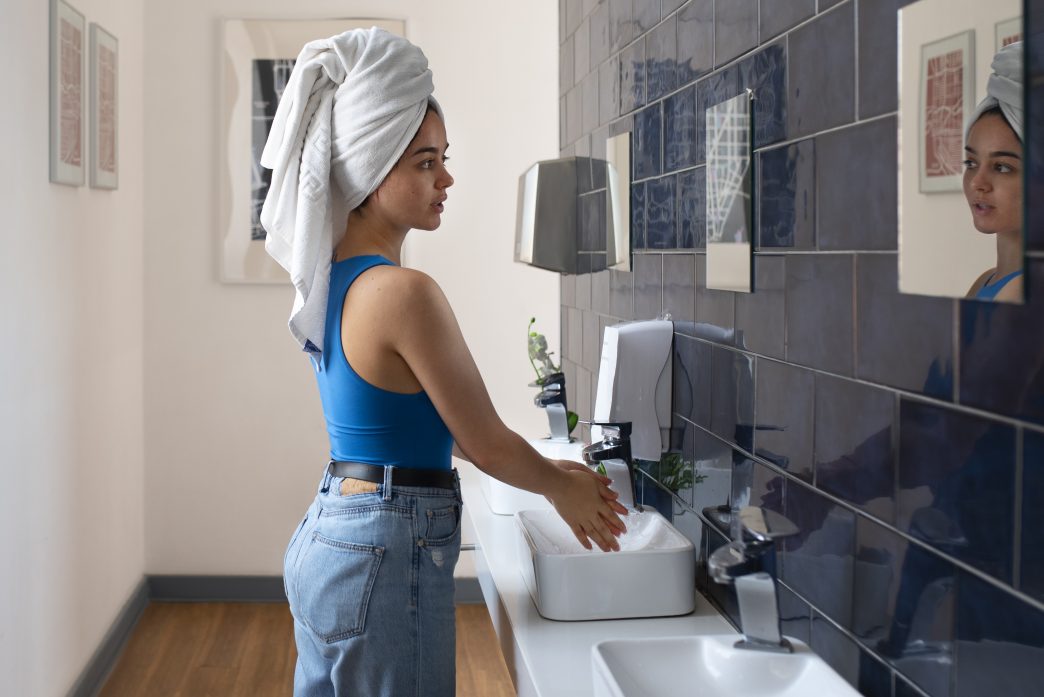 Modern bathroom with updated hardware, fresh paint, and stylish decor showcasing budget-friendly bathroom upgrades.