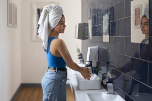 Modern bathroom with updated hardware, fresh paint, and stylish decor showcasing budget-friendly bathroom upgrades.