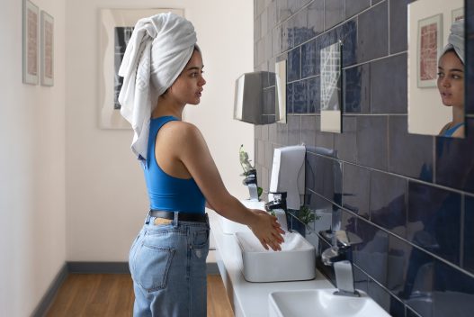 Modern bathroom with updated hardware, fresh paint, and stylish decor showcasing budget-friendly bathroom upgrades.