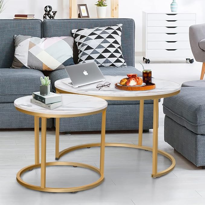 Set of minimalist nesting tables in a small living area, showing versatile furniture arrangement for space-saving