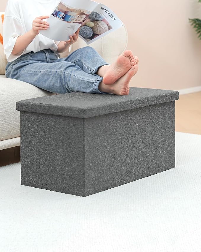 Compact ottoman with storage used as coffee table in a small modern living room