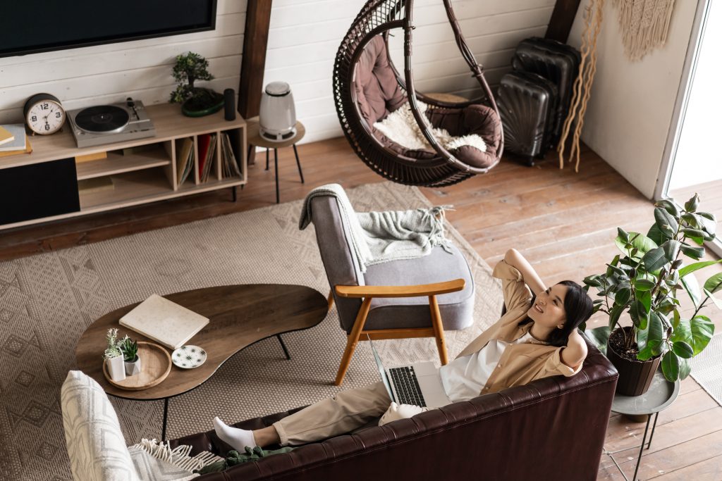 Wall-mounted shelves and multifunctional furniture pieces in a compact apartment for smart space utilization
