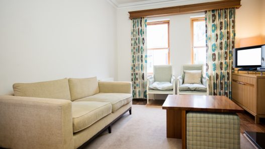Modern small apartment interior featuring space-saving furniture and stylish decor to maximize limited living space