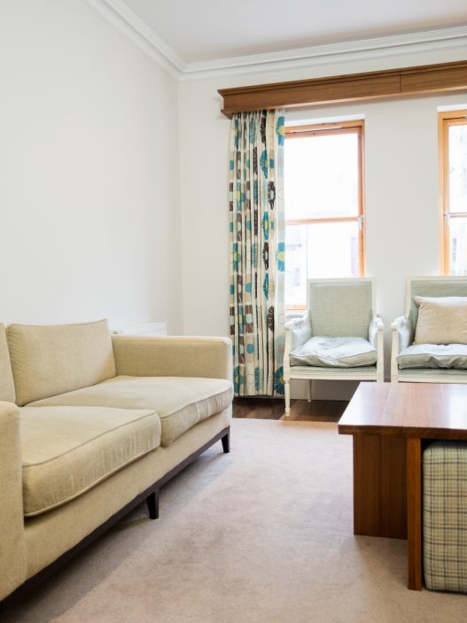 Modern small apartment interior featuring space-saving furniture and stylish decor to maximize limited living space